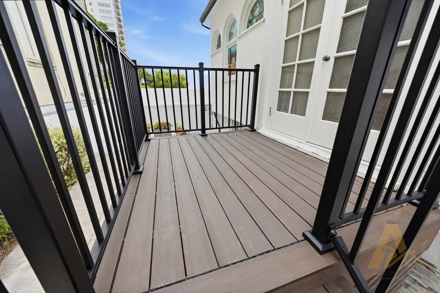 Finished deck landing beside French doors